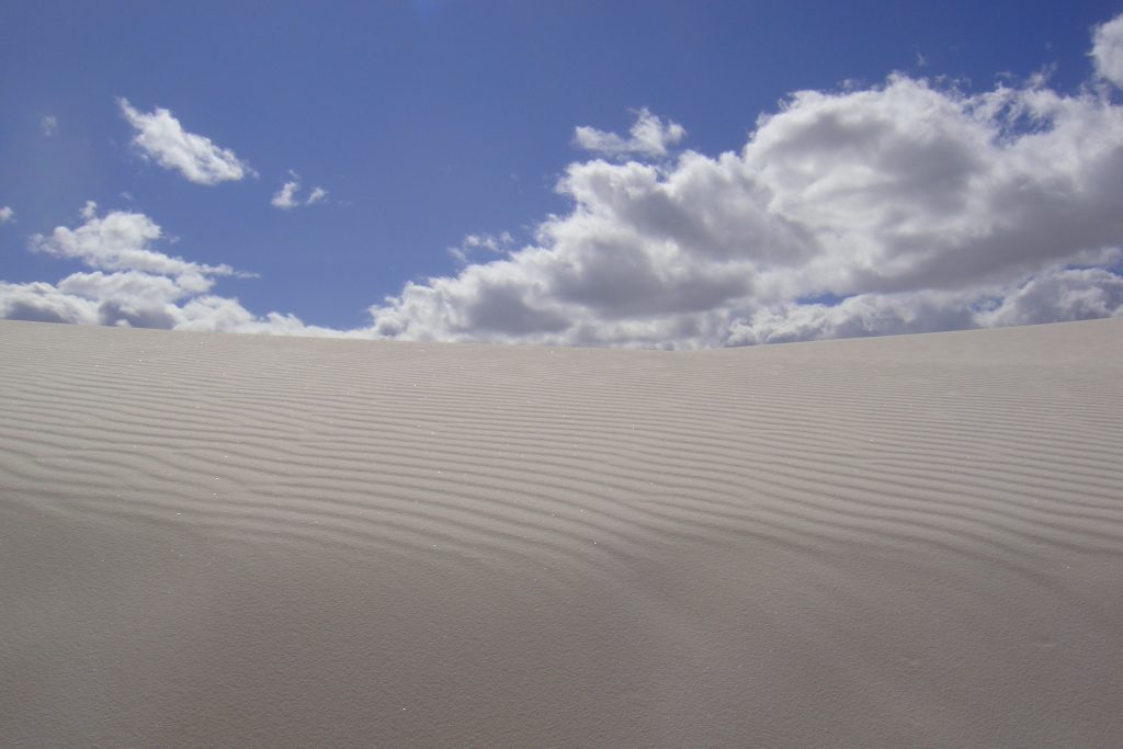 The dune is made of white sand